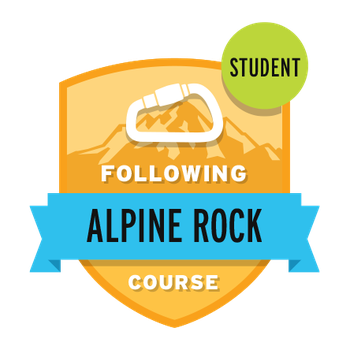 Following Alpine Rock Course Student